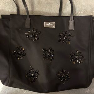 Black Kate spade bag w/ flower stone details